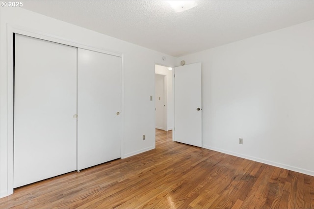 10700 NE 46th St, Vancouver, WA 98682 - unfurnished bedroom featuring light wood finished floors, a closet, and baseboards