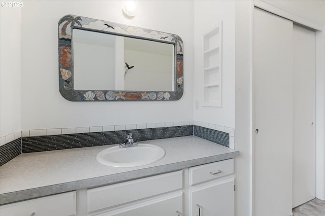 10700 NE 46th St, Vancouver, WA 98682 - bathroom featuring vanity and tasteful backsplash