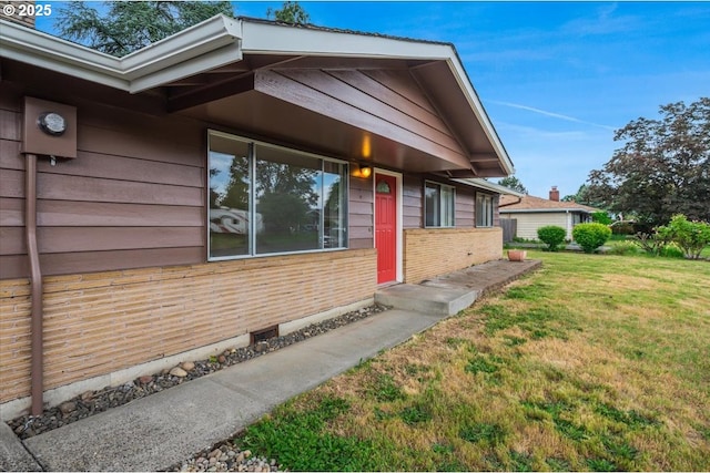 10700 NE 46th St, Vancouver, WA 98682 - view of home's exterior with brick siding and a lawn