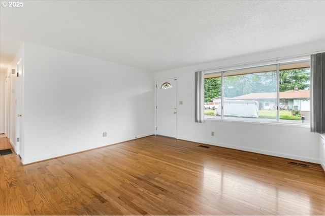 10700 NE 46th St, Vancouver, WA 98682 - spare room featuring light wood-style floors and baseboards