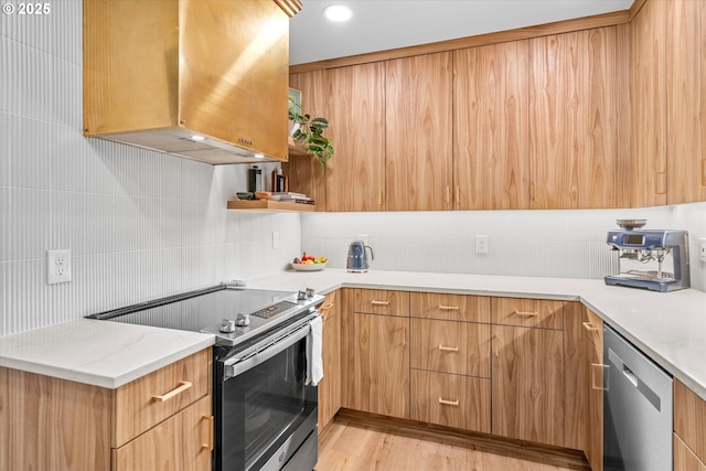 12718 SE 28th Ave, Milwaukie, OR 97222 - kitchen with appliances with stainless steel finishes, range hood, backsplash, and modern cabinets