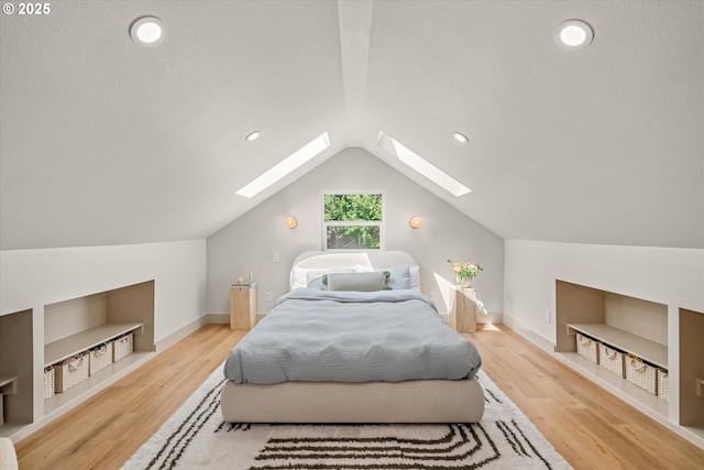 12718 SE 28th Ave, Milwaukie, OR 97222 - bedroom with a skylight, wood finished floors, vaulted ceiling, and recessed lighting