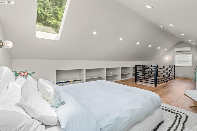 12718 SE 28th Ave, Milwaukie, OR 97222 - bedroom with a wall mounted AC, a skylight, lofted ceiling, wood finished floors, and recessed lighting