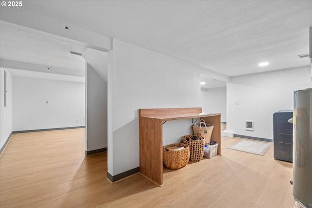 12718 SE 28th Ave, Milwaukie, OR 97222 - corridor featuring wood finished floors, heating unit, and recessed lighting