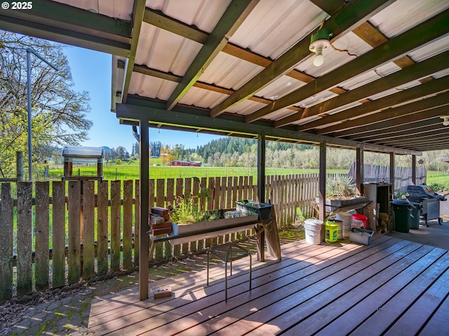 deck with grilling area and fence