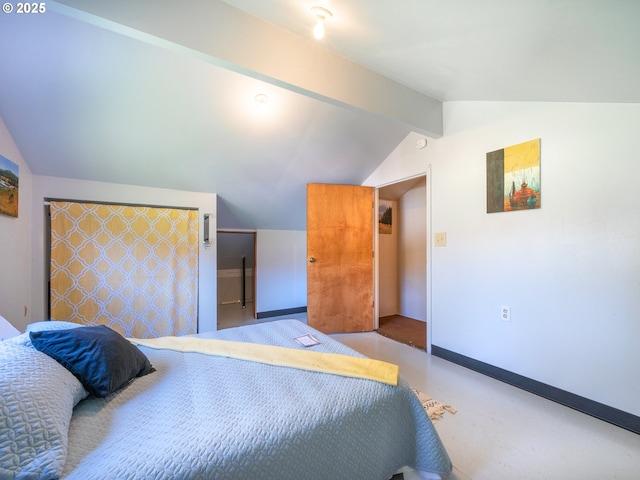 bedroom with baseboards and vaulted ceiling with beams