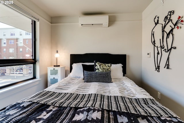 bedroom with a wall mounted air conditioner