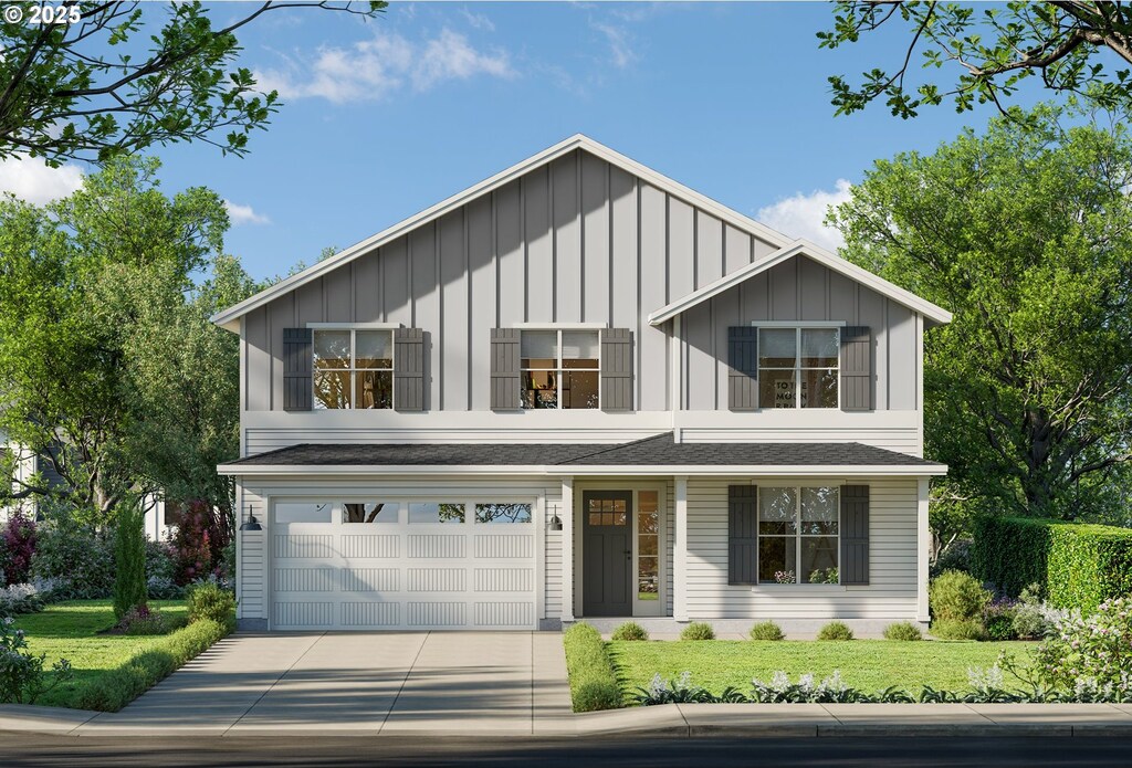 1291 Rachel Ln, Molalla, OR 97038 - view of front of home with board and batten siding, concrete driveway, an attached garage, and a front yard