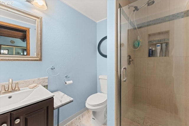 full bath with toilet, marble finish floor, a shower stall, baseboards, and vanity