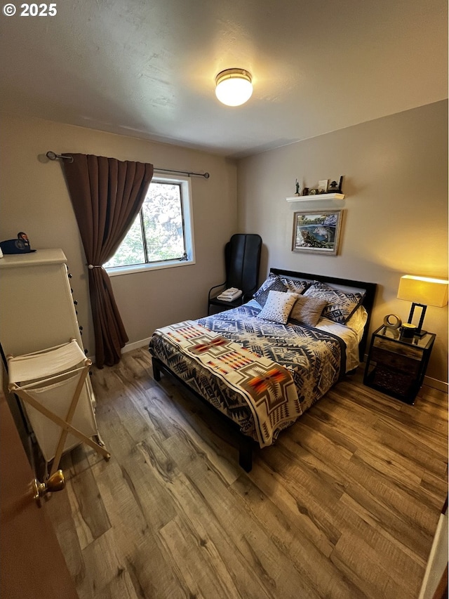 475 Burnham Ave, Maupin, OR 97037 - bedroom featuring wood finished floors and baseboards
