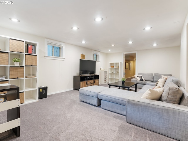 living area with recessed lighting, carpet flooring, and baseboards