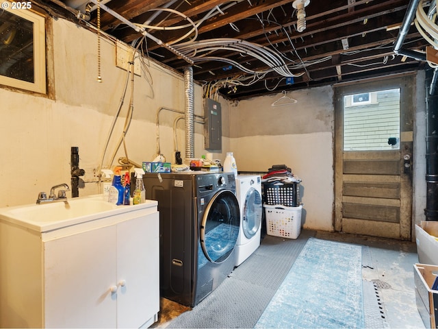 washroom featuring washer and dryer and electric panel