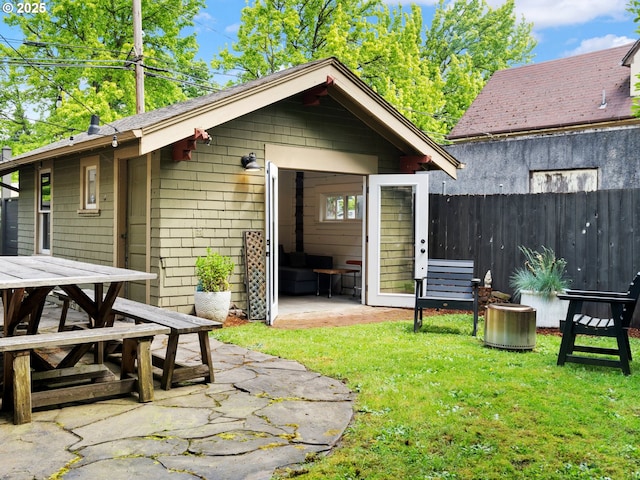 view of outdoor structure featuring outdoor dining space