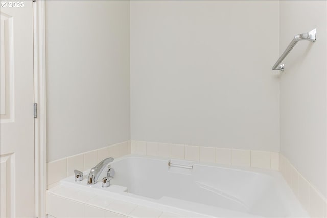 bathroom with a garden tub