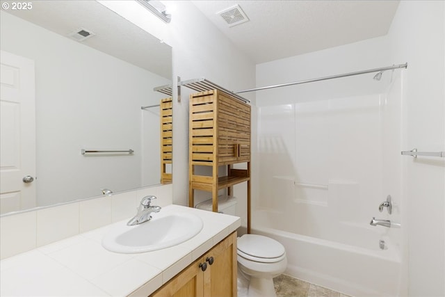 full bathroom with toilet, vanity, shower / tub combination, and visible vents