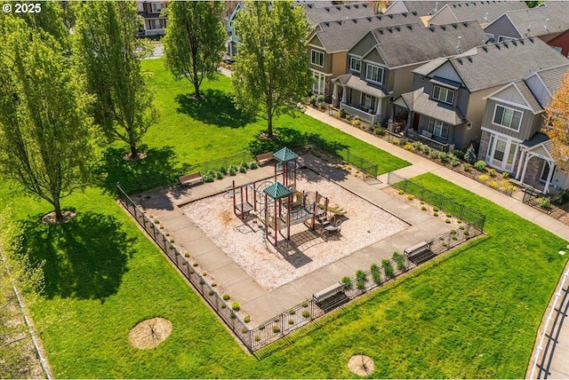 exterior space with a residential view and a playground