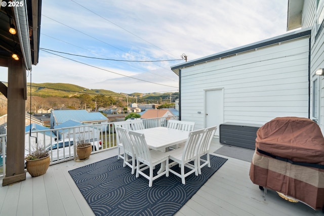 wooden terrace featuring a mountain view