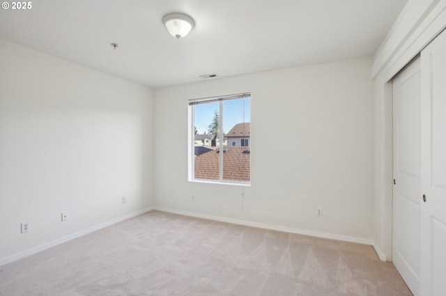 5264 NE 121st Ave Unit K67, Vancouver, WA 98682 - unfurnished bedroom with a closet, light carpet, and baseboards