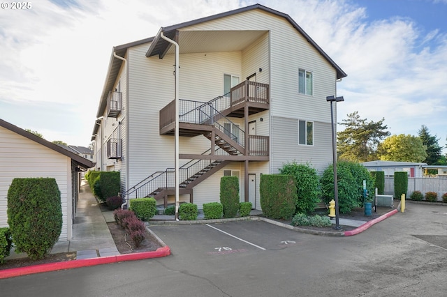 5264 NE 121st Ave Unit K67, Vancouver, WA 98682 - view of property featuring stairs and uncovered parking