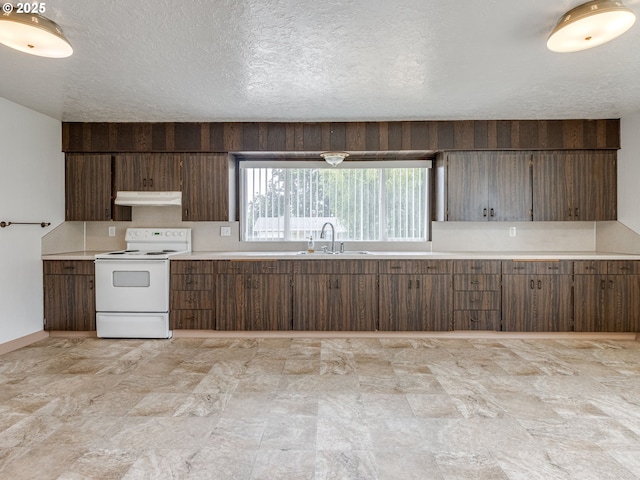 7804 NW 1st Ave, Vancouver, WA 98665 - kitchen with white electric range, under cabinet range hood, light countertops, and a textured ceiling