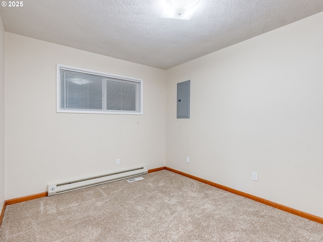 7804 NW 1st Ave, Vancouver, WA 98665 - spare room with a baseboard radiator, electric panel, carpet, and a textured ceiling