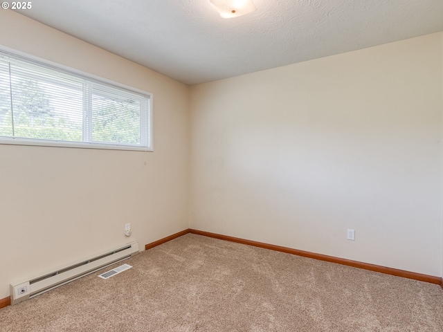 7804 NW 1st Ave, Vancouver, WA 98665 - carpeted empty room with baseboard heating and baseboards