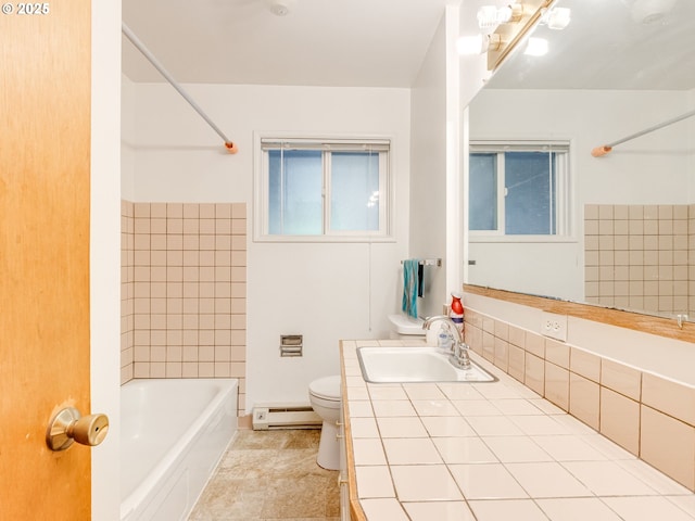 7804 NW 1st Ave, Vancouver, WA 98665 - full bathroom featuring baseboard heating, vanity, and shower / tub combination
