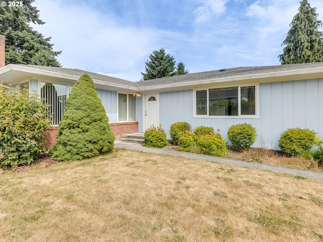 7804 NW 1st Ave, Vancouver, WA 98665 - ranch-style home featuring a front lawn, board and batten siding, and brick siding