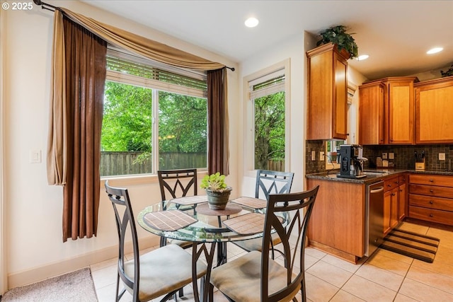 17544 SW Keystone Ct, Beaverton, OR 97007 - dining space with light tile patterned floors, recessed lighting, and baseboards