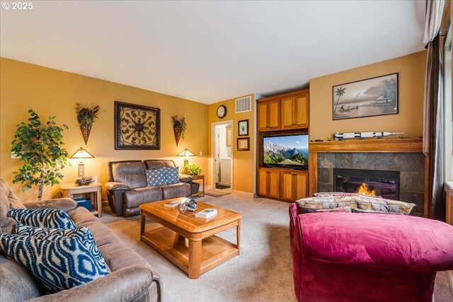 17544 SW Keystone Ct, Beaverton, OR 97007 - living area featuring light colored carpet and a tile fireplace