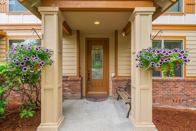 17544 SW Keystone Ct, Beaverton, OR 97007 - entrance to property featuring brick siding and covered porch