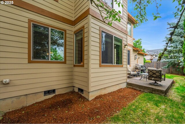 17544 SW Keystone Ct, Beaverton, OR 97007 - view of home's exterior featuring a patio and crawl space