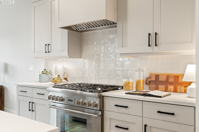 2901 NW 114th Ter, Portland, OR 97229 - kitchen with high end stainless steel range, premium range hood, light countertops, and white cabinets