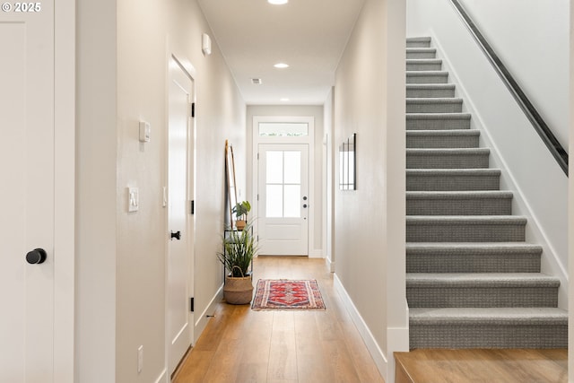 2901 NW 114th Ter, Portland, OR 97229 - foyer entrance featuring light wood-type flooring, stairs, baseboards, and recessed lighting