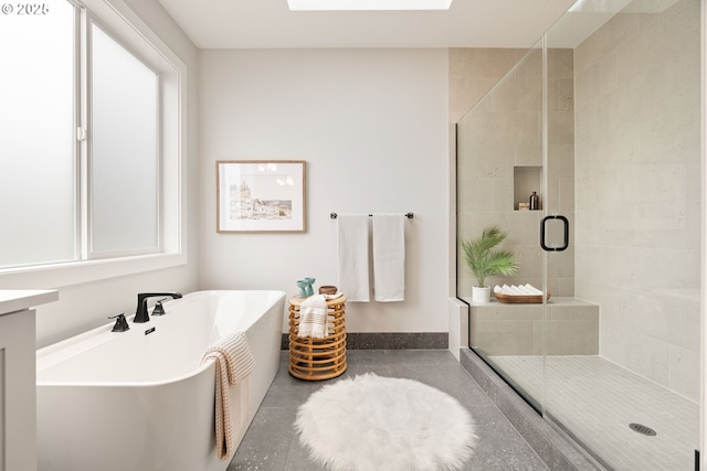 2901 NW 114th Ter, Portland, OR 97229 - full bath with a soaking tub, a shower stall, and a skylight