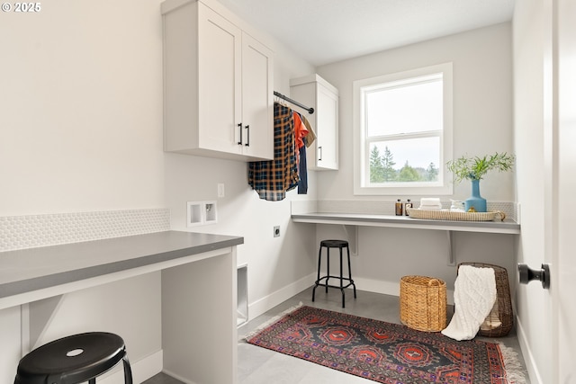 2901 NW 114th Ter, Portland, OR 97229 - laundry room with electric dryer hookup, cabinet space, washer hookup, and baseboards