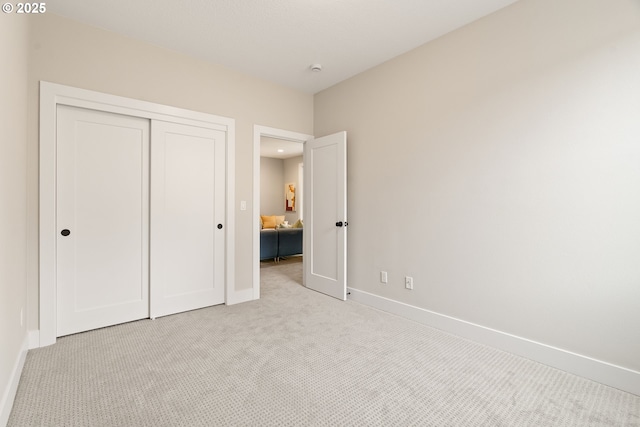 2901 NW 114th Ter, Portland, OR 97229 - unfurnished bedroom with carpet floors, baseboards, and a closet