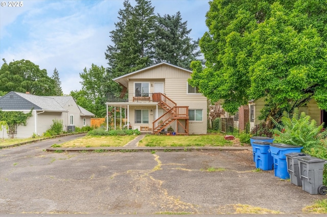 3400 E 13th St, Vancouver, WA 98661 - view of front of property featuring stairway, a wooden deck, and brick siding