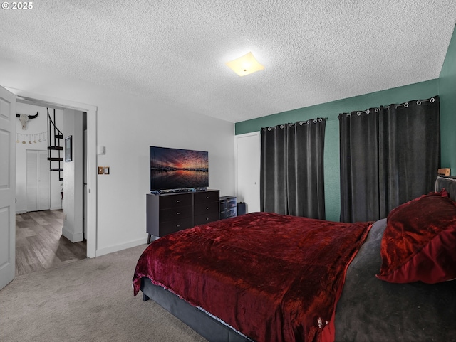 346 NE Skipanon Dr Unit 46, Warrenton, OR 97146 - bedroom featuring carpet flooring and a textured ceiling