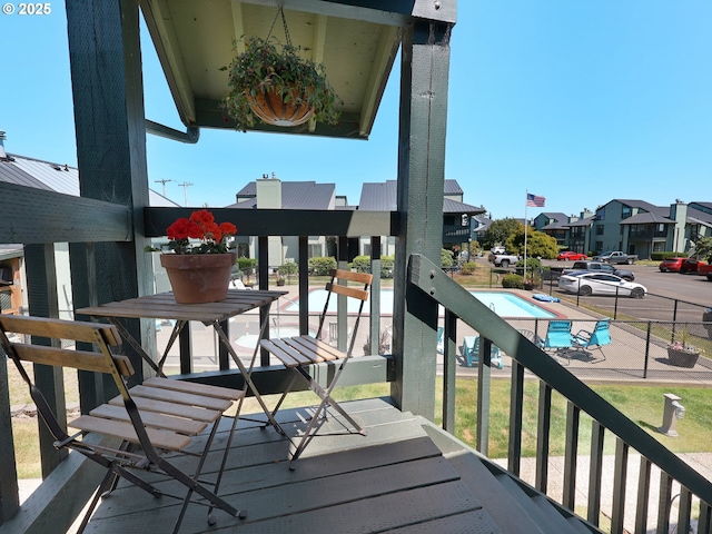 346 NE Skipanon Dr Unit 46, Warrenton, OR 97146 - balcony featuring a residential view