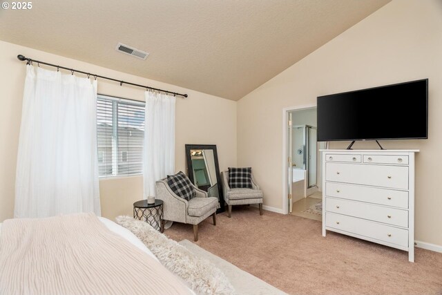 13765 SW Florentine Ave, Portland, OR 97223 - bedroom featuring lofted ceiling, light colored carpet, baseboards, and ensuite bathroom
