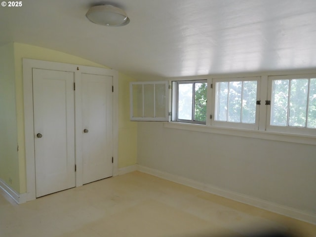 84105 Winesap Rd, Milton-Freewater, OR 97862 - unfurnished bedroom with baseboards, a closet, and lofted ceiling