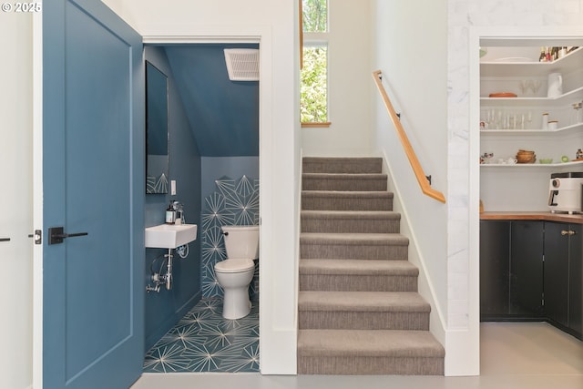 staircase with visible vents