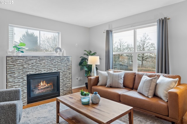 living room with a wealth of natural light and light wood-type flooring