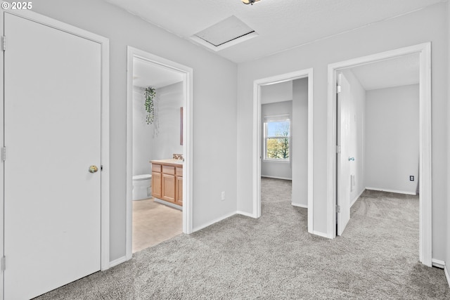 hallway with light carpet