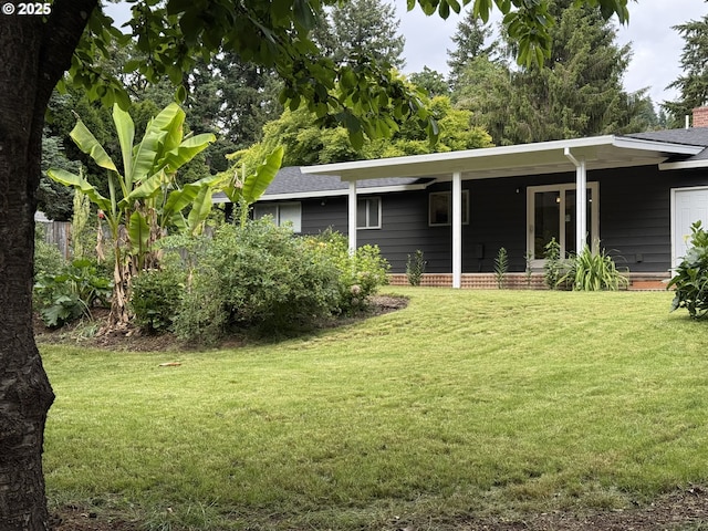 2420 Margery St, West Linn, OR 97068 - rear view of property with a yard, covered porch, and roof with shingles