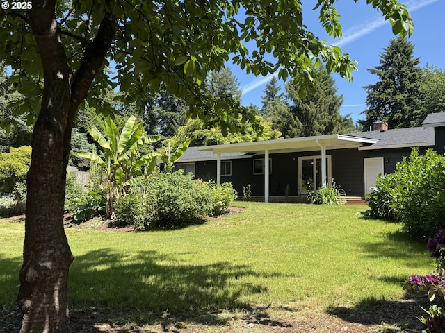 2420 Margery St, West Linn, OR 97068 - view of grassy yard with an attached garage