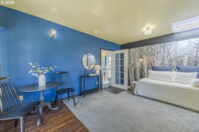 397 S 32nd St, Springfield, OR 97478 - bedroom featuring wood finished floors, multiple windows, and ensuite bath