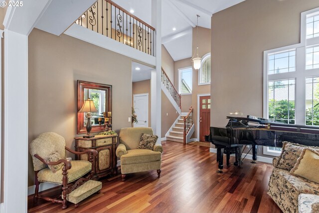 12919 NE 37th Ct, Vancouver, WA 98686 - living room featuring a high ceiling, wood finished floors, and stairway