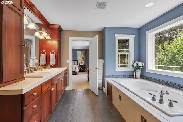 12919 NE 37th Ct, Vancouver, WA 98686 - bathroom with vanity, a garden tub, connected bathroom, and recessed lighting